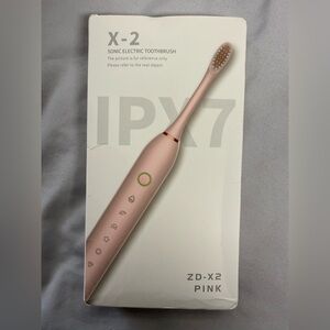 New IPX7 Pink Sonic Electric Toothbrush